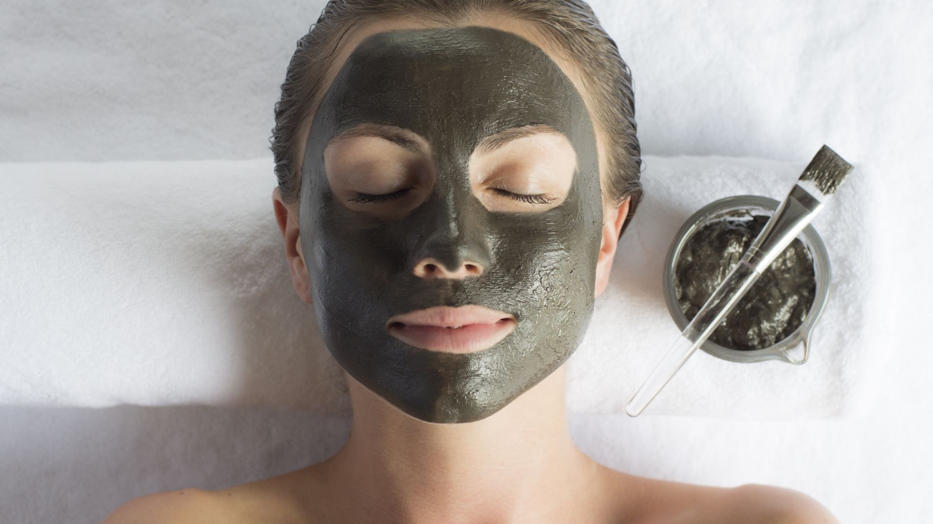 Woman with spa face mask 