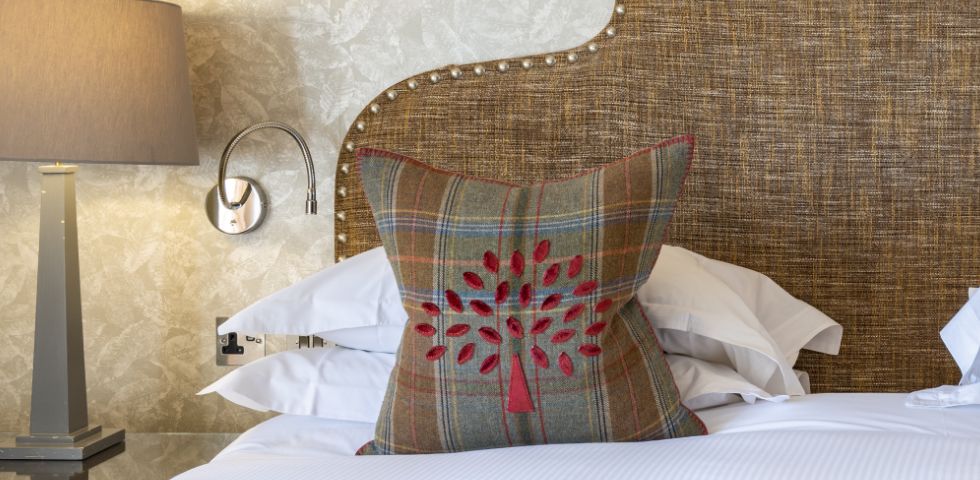 Single rooms at Bovey Castle interior details - cushion on bed